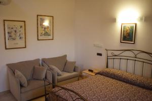 Postel nebo postele na pokoji v ubytování Albergo Bice