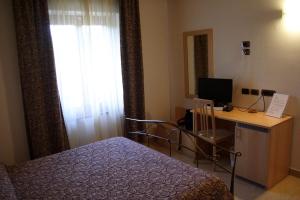 TV a/nebo společenská místnost v ubytování Albergo Bice