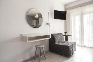 TV a/nebo společenská místnost v ubytování Afkos Apartments