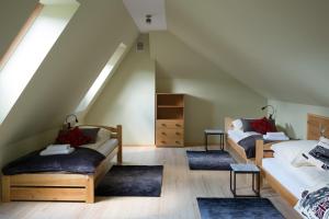 Posteľ alebo postele v izbe v ubytovaní Apartamenty Rodzinne II ApartZakop