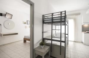 Postel nebo postele na pokoji v ubytování Afkos Apartments