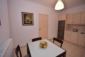Kuchyňa alebo kuchynka v ubytovaní Keratea Apartment Athens Airport