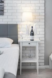 Posteľ alebo postele v izbe v ubytovaní Salomea Krakow apartments