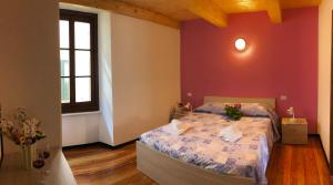 Postel nebo postele na pokoji v ubytování Hotel Mojito
