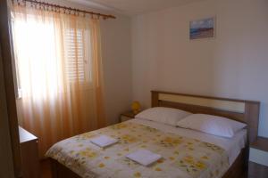 Postel nebo postele na pokoji v ubytování Apartments Čobanov