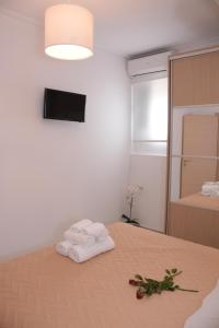 Posteľ alebo postele v izbe v ubytovaní Keratea Apartment Athens Airport