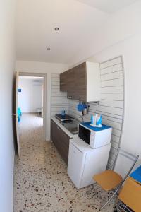 A kitchen or kitchenette at Le Sette Meraviglie