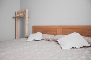 Łóżko lub łóżka w pokoju w obiekcie Pension Casa Maruja