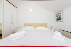 Postel nebo postele na pokoji v ubytování Mediterranean Blue Apartments