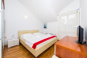 Postel nebo postele na pokoji v ubytování Mediterranean Blue Apartments