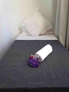 Posteľ alebo postele v izbe v ubytovaní Hostal Argo