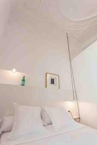 Posteľ alebo postele v izbe v ubytovaní Hostal Argo