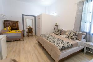 Letto o letti in una camera di Mascot Boutique Hotel