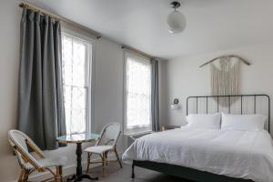 Postel nebo postele na pokoji v ubytování Surf Hotel & Chateau