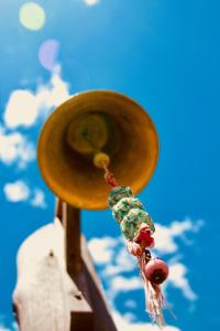 a sombrero with a necklace hanging from it at Octogono Om Shanti in Villa Serrana