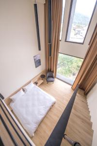 Postelja oz. postelje v sobi nastanitve KET Hotel