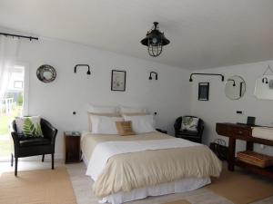 Tempat tidur dalam kamar di Beautiful Bungalow CBD