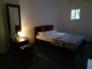Postel nebo postele na pokoji v ubytování House of Seya