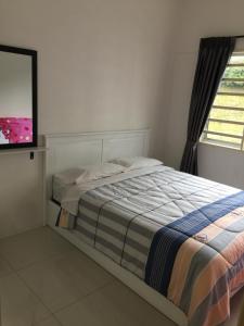 Ένα ή περισσότερα κρεβάτια σε δωμάτιο στο Cameron Prima Apartment @ Cameron Jaya