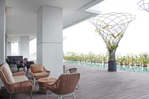 Posezení v ubytování Goodrich Suites, Jakarta