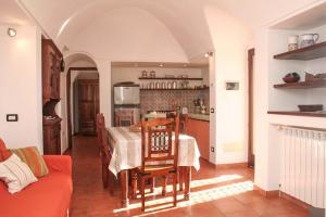 Kuchyň nebo kuchyňský kout v ubytování Dammuso Favarelle da Caty