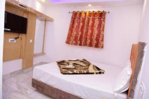 Postel nebo postele na pokoji v ubytování Friends Hostel by Backpackers Heaven- New Delhi Railway Station - Paharganj