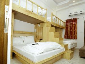 Postel nebo postele na pokoji v ubytování Friends Hostel by Backpackers Heaven- New Delhi Railway Station - Paharganj + 34 fotografií