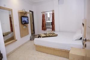 Postel nebo postele na pokoji v ubytování Friends Hostel by Backpackers Heaven- New Delhi Railway Station - Paharganj