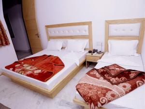 Postel nebo postele na pokoji v ubytování Friends Hostel by Backpackers Heaven- New Delhi Railway Station - Paharganj