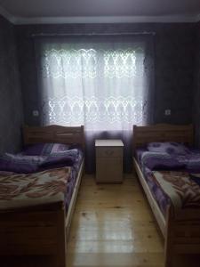 Postel nebo postele na pokoji v ubytování I R K O