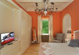 TV a/nebo společenská místnost v ubytování Lauri Loft