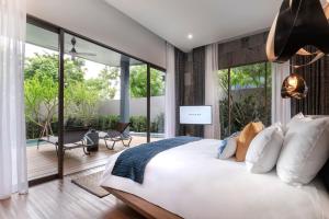 Katil atau katil-katil dalam bilik di Navana Nature Escape - SHA Extra Plus +39 gambar
