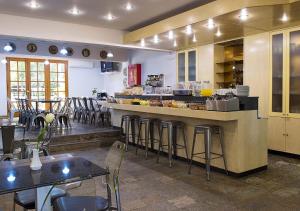 Reštaurácia alebo iné gastronomické zariadenie v ubytovaní Stefanakis Hotel & Apartments