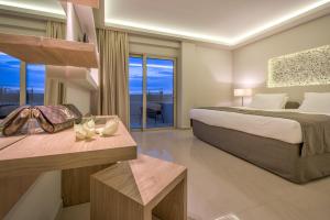 Voodi või voodid majutusasutuse Azure Resort & Spa toas