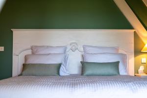 New Cottage & spa de nage Guesthouse客房内的一张或多张床位