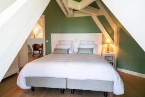 New Cottage & spa de nage Guesthouse客房内的一张或多张床位