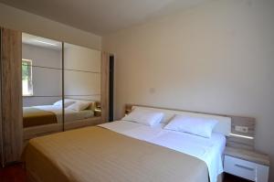 Ein Bett oder Betten in einem Zimmer der Unterkunft Sistak House