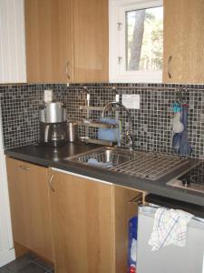 A kitchen or kitchenette at Villa Lullyhill