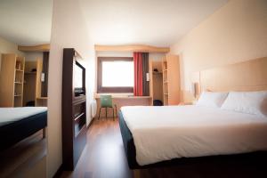 Postel nebo postele na pokoji v ubytování ibis Grenoble Gare