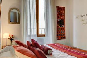 Postel nebo postele na pokoji v ubytování Cocoon'in Cannes Le Suquet