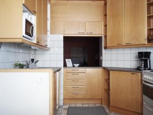 Virtuvė arba virtuvėlė apgyvendinimo įstaigoje 2ndhomes Mikonkatu Apartment
