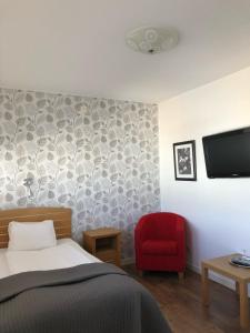 TV a/nebo společenská místnost v ubytování Hotell City