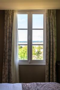 New Cottage & spa de nage Guesthouse客房内的一张或多张床位