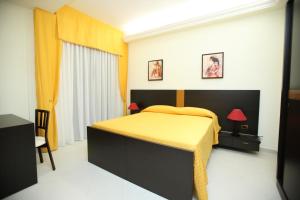 Postel nebo postele na pokoji v ubytování B&B Armony 111