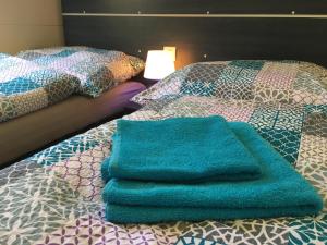 Postel nebo postele na pokoji v ubytování Mobile Homes Comfort ELBA Zelena Laguna