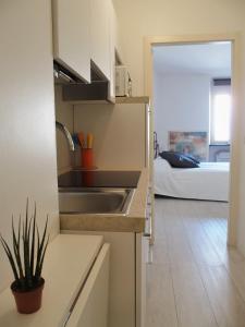 A kitchen or kitchenette at La Dorata