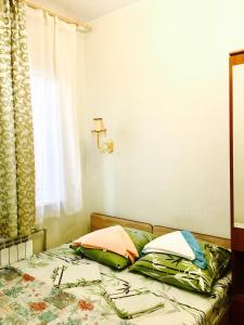 Кровать или кровати в номере Apartments Gorkogo 21