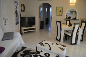 TV a/nebo společenská místnost v ubytování Marina LOCDENIA