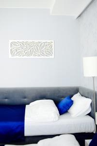 Łóżko lub łóżka w pokoju w obiekcie JessApart – Ochota Apartments