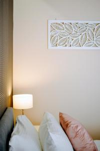Łóżko lub łóżka w pokoju w obiekcie JessApart – Ochota Apartments